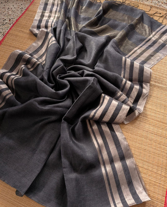Gray Pure 100-count Jayashree linen saree with tested zari double border on both sides and zari palla, including running blouse piece from Rihyaaz Fashions.