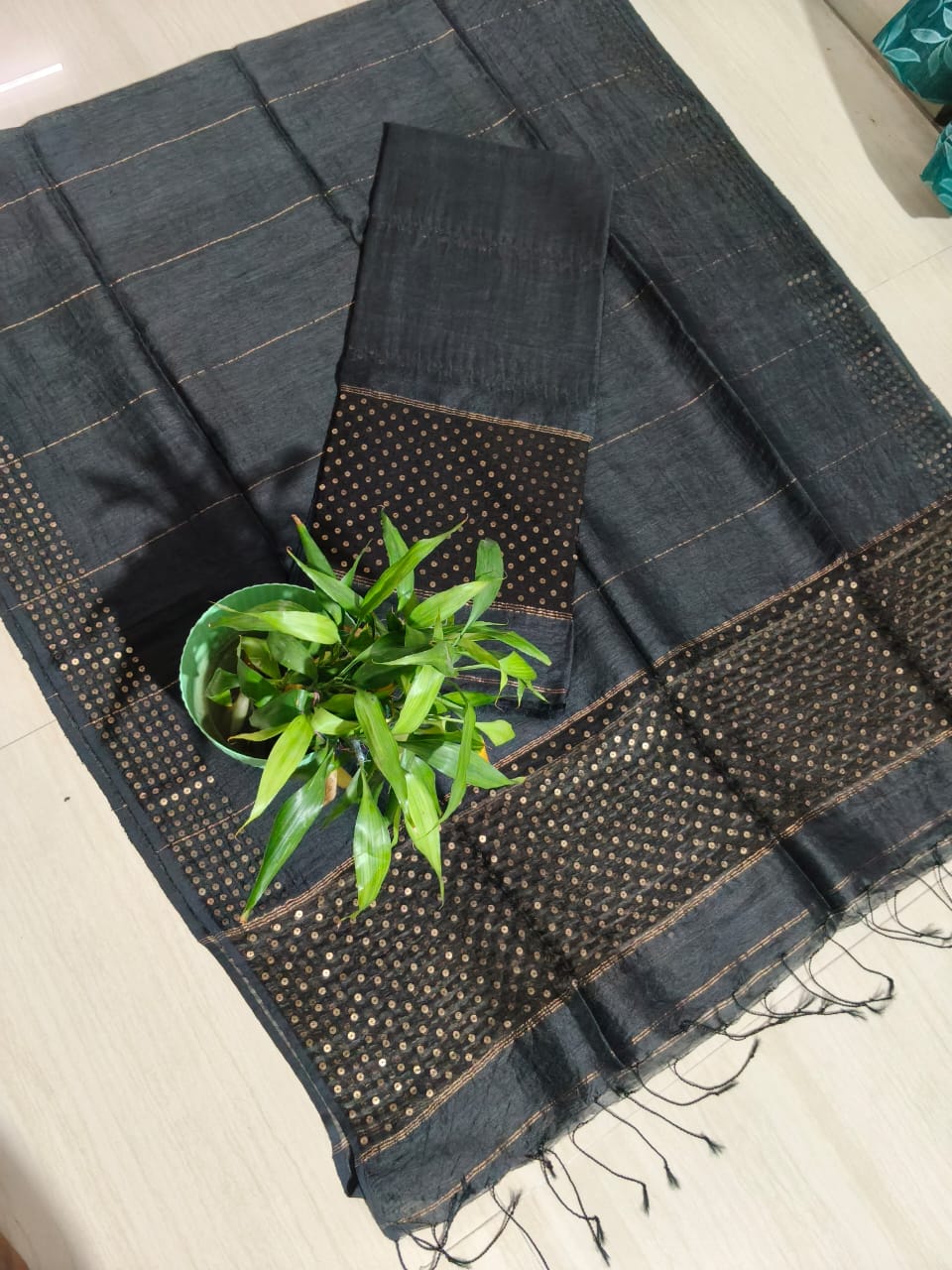 Ira new handwoven Silk Linen Jamdani suit set with 3 meter top and 2.5 meter dupatta featuring elegant net tassel detailing by Rihyaaz.