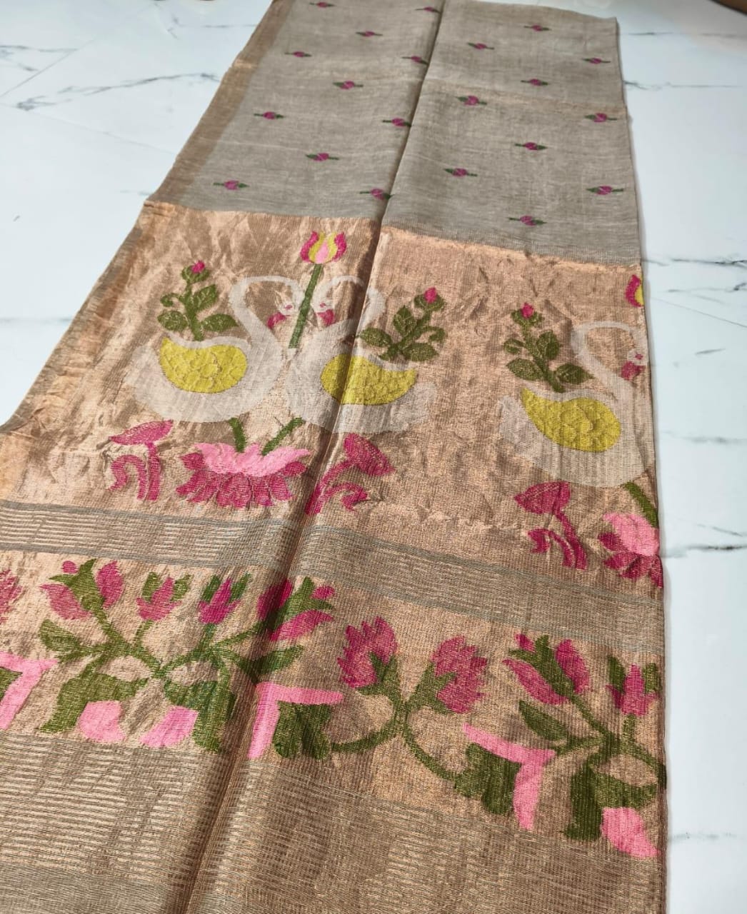 Batakh Silk Tissue Linen Saree by Rihyaaz – a luxurious handwoven saree blending silk tissue elegance with timeless Indian craftsmanship. Perfect for festive and occasion wear.