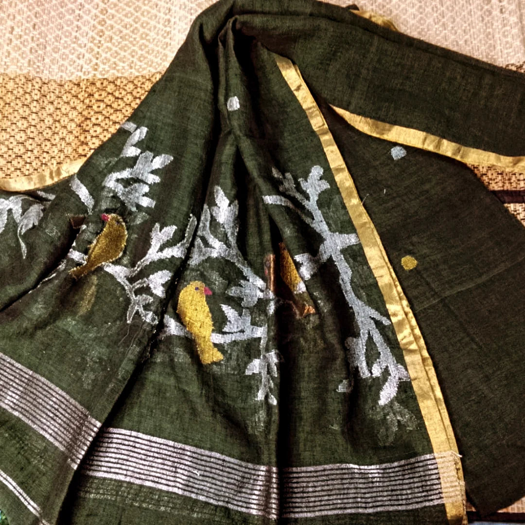 Panchchi - Dual Zari Bird Weaved Linen Jamdani Suit by Rihyaaz featuring handwoven premium linen fabric with intricate dual zari bird motifs and traditional Jamdani weaving, ideal for festive and ethnic occasions.