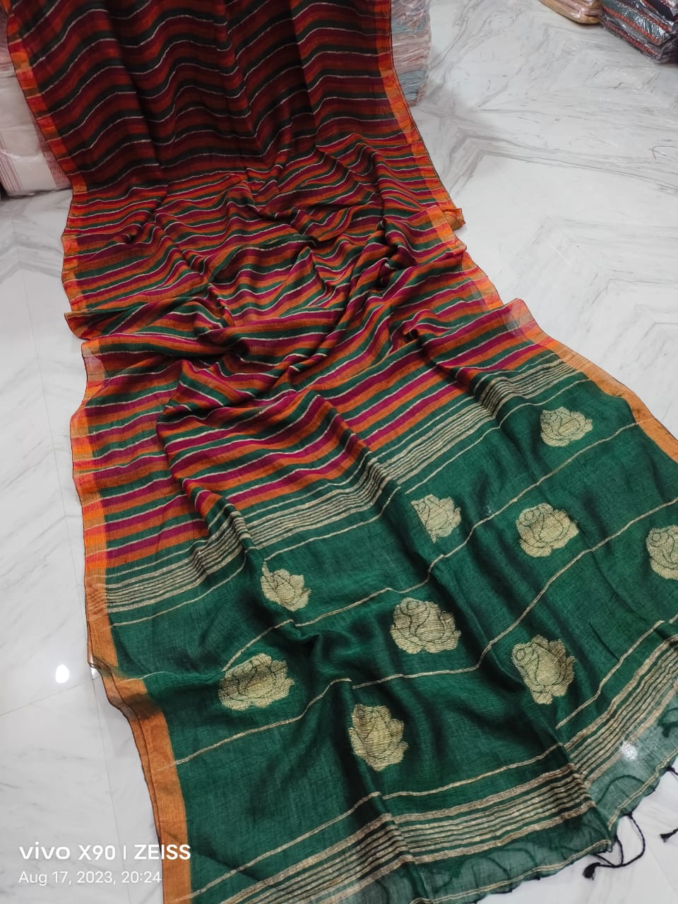 Rose handwoven striped linen saree with elegant woven stripes, rose motifs, and a lightweight traditional handloom texture by Rihyaaz 