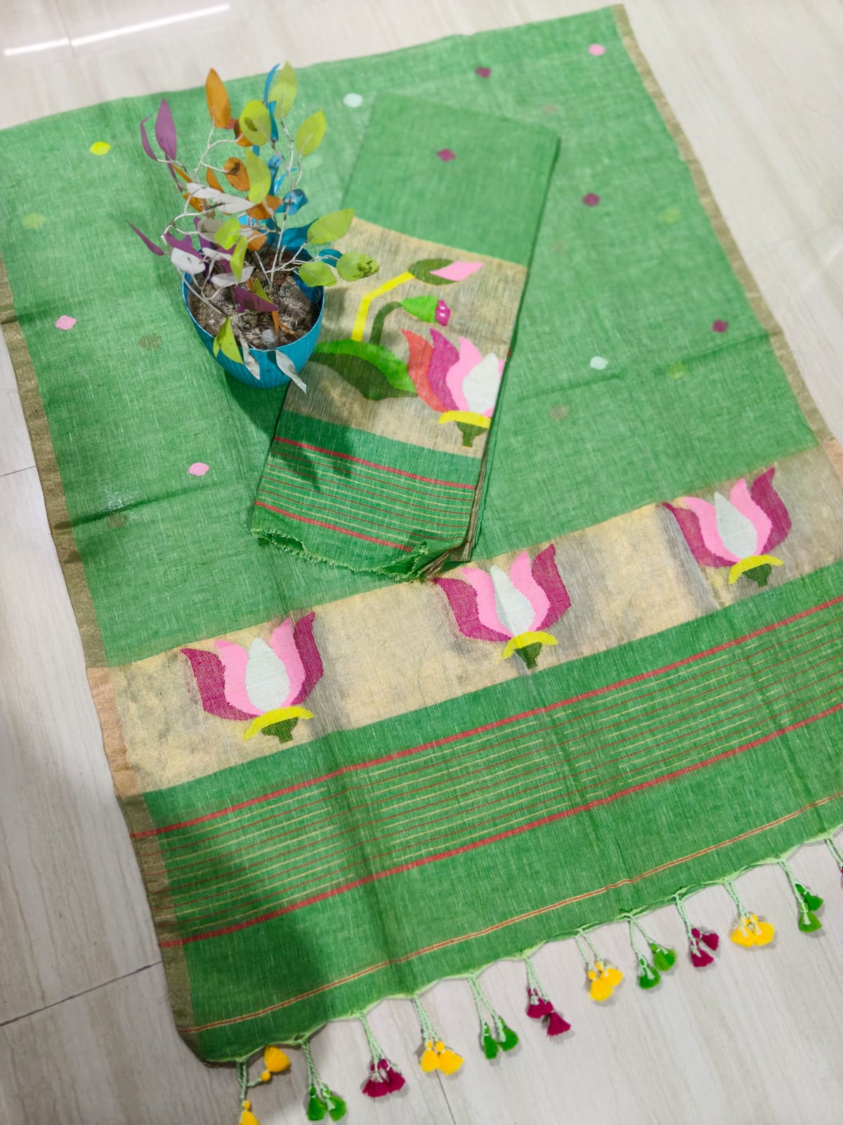 Cocoon Green Jayshree linen by linen suit with intricate needle tissue patta Jamdani weaving, premium traditional ethnic wear by Rihyaaz.