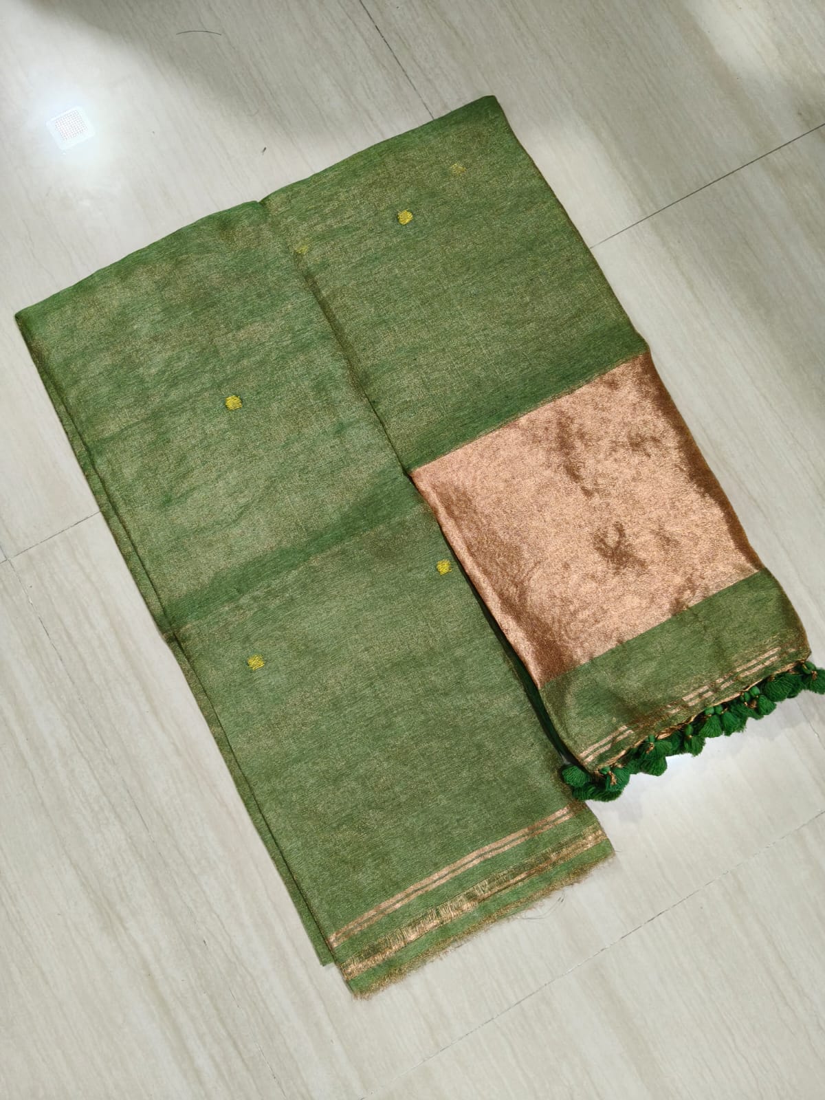 Premium silk tissue linen suit set with broad zari palla dupatta in elegant festive ethnic wear for women.