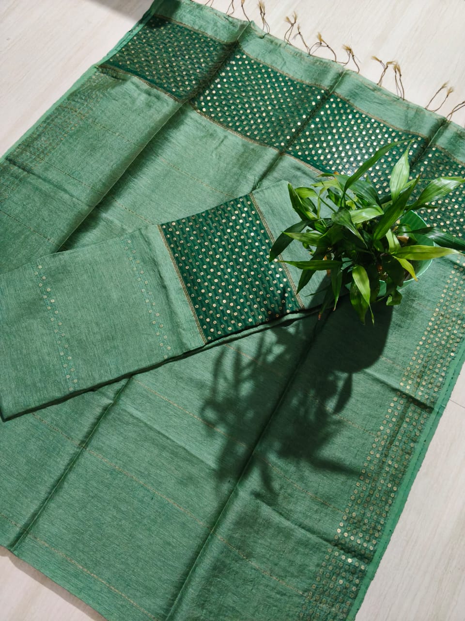 Ira new handwoven Silk Linen Jamdani suit set with 3 meter top and 2.5 meter dupatta featuring elegant net tassel detailing by Rihyaaz.