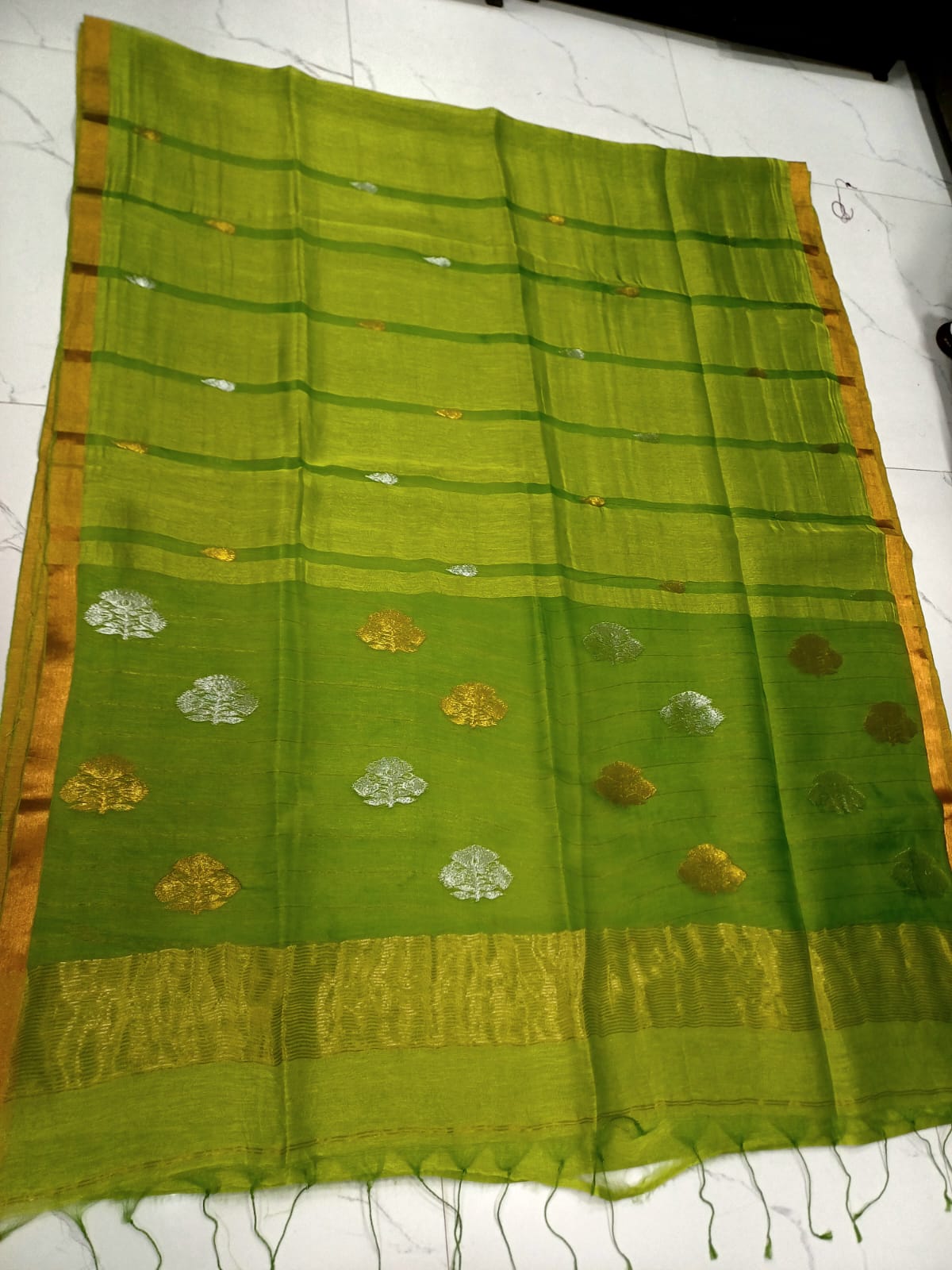 Silkmark Certified Green Bengal Handloom Tie and Dye Tushar saree with all-over design, contrast border and blouse piece by Rihyaaz.