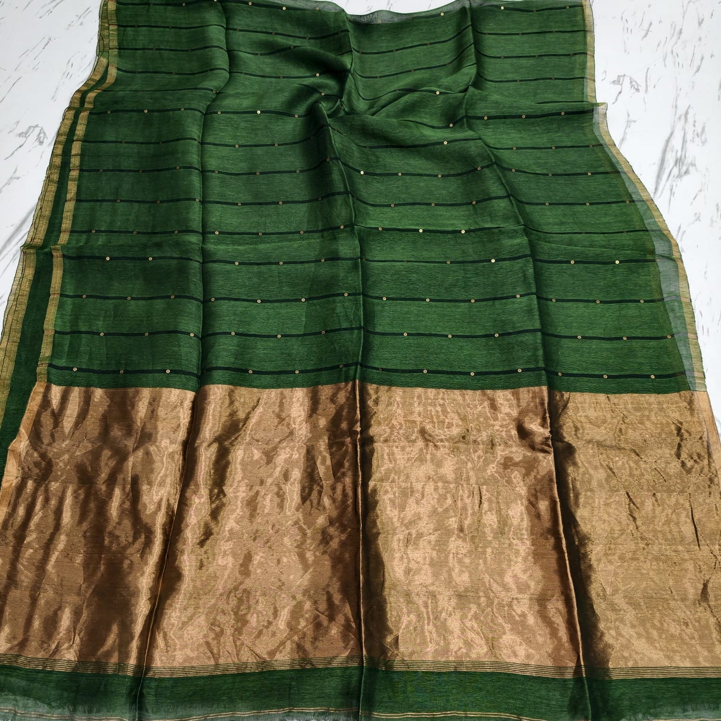 Nakshi Tissue Palla Resham Sequin Weaved Matka Saree by Rihyaaz, featuring elegant traditional weaving and luxurious tissue palla detailing.