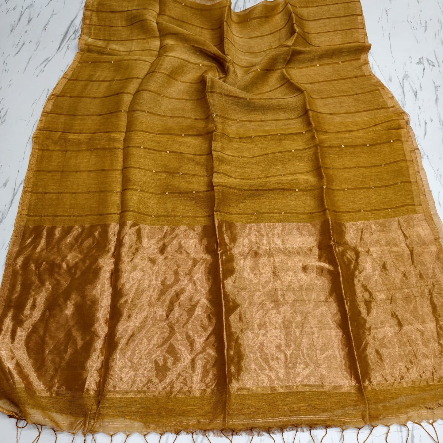 Nakshi Tissue Palla Resham Sequin Weaved Matka Saree by Rihyaaz, featuring elegant traditional weaving and luxurious tissue palla detailing.
