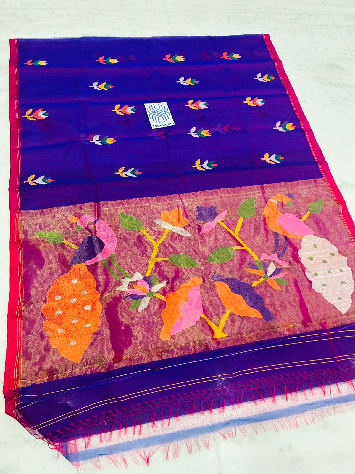Shahi pure muslin handwoven saree with blouse piece by Rihyaaz, showcasing traditional Indian handloom craftsmanship and elegant woven texture.