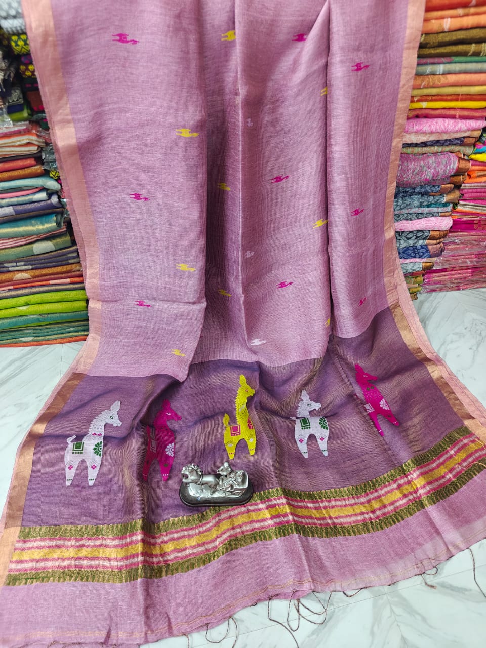 Terracotta Linen Silk Saree with intricate Resham woven palla by Rihyaaz, premium handwoven ethnic saree featuring elegant craftsmanship, soft drape, and timeless festive wear for women