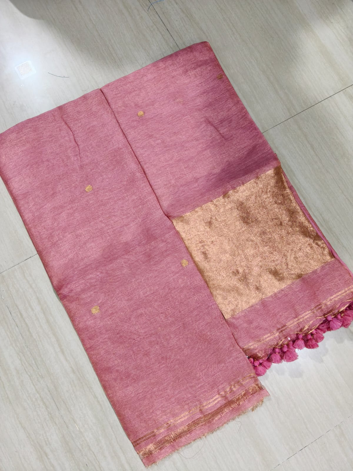 Premium silk tissue linen suit set with broad zari palla dupatta in elegant festive ethnic wear for women.