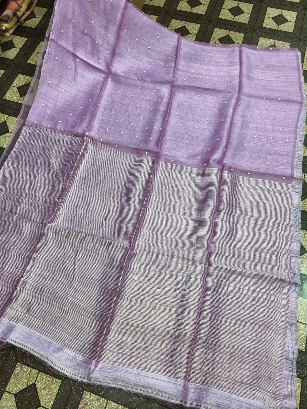 Shatranj Pure Matka Muslin Silk saree with zari border and all-over white sequin sea-shell woven palla, paired with running Matka blouse piece by Rihyaaz 