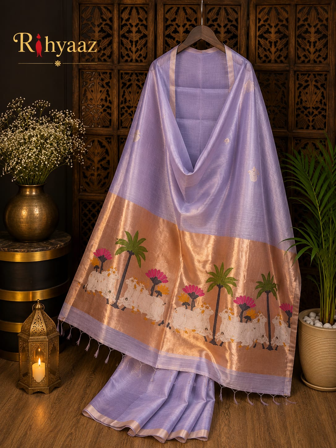 Kamdhenu Silk Linen Pichwai Motif Paithani Jamdani Saree by Rihyaaz featuring intricate Pichwai-inspired weaving, elegant Paithani pallu, handcrafted details, and a plain blouse piece for festive and traditional wear.