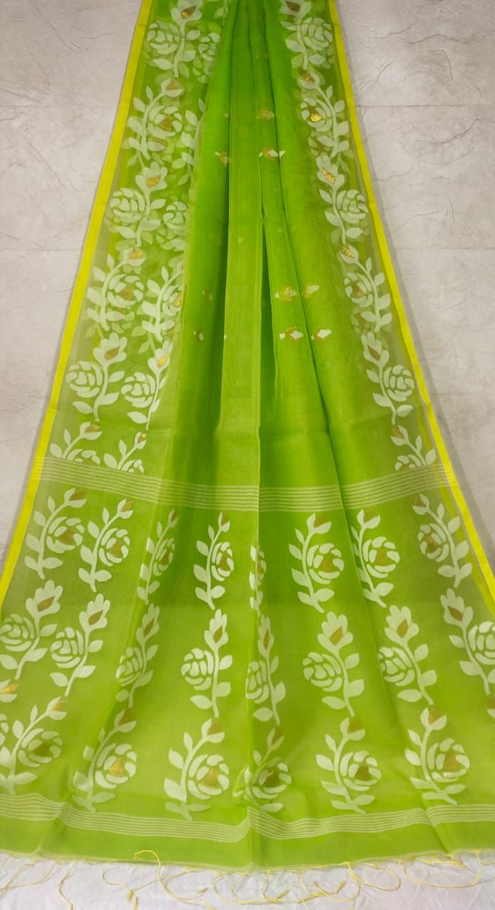 Muslin jacquard weaving saree by Rihyaaz featuring intricate woven patterns and an elegant lightweight drape.