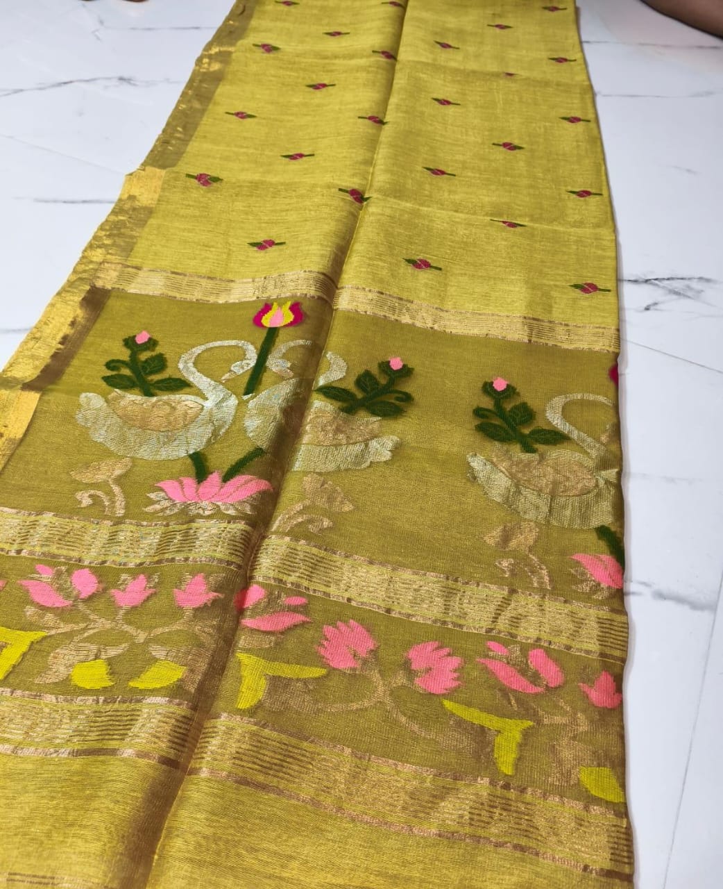 Batakh Silk Tissue Linen Saree by Rihyaaz – a luxurious handwoven saree blending silk tissue elegance with timeless Indian craftsmanship. Perfect for festive and occasion wear.