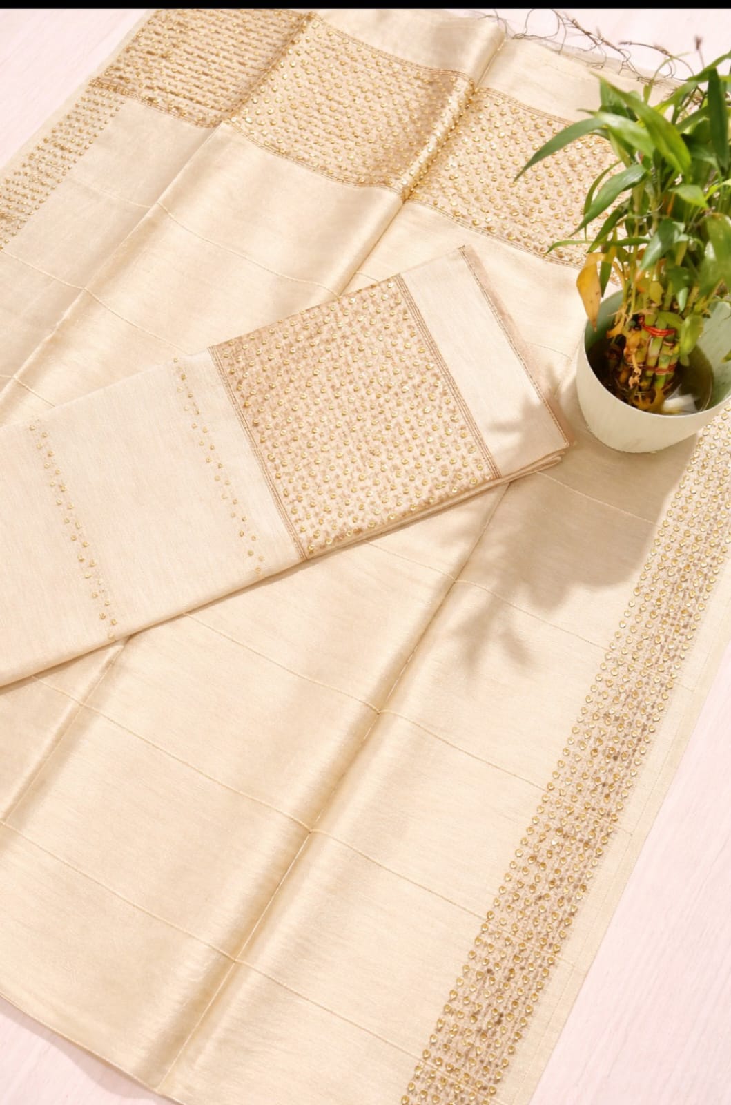Ira new handwoven Silk Linen Jamdani suit set with 3 meter top and 2.5 meter dupatta featuring elegant net tassel detailing by Rihyaaz.