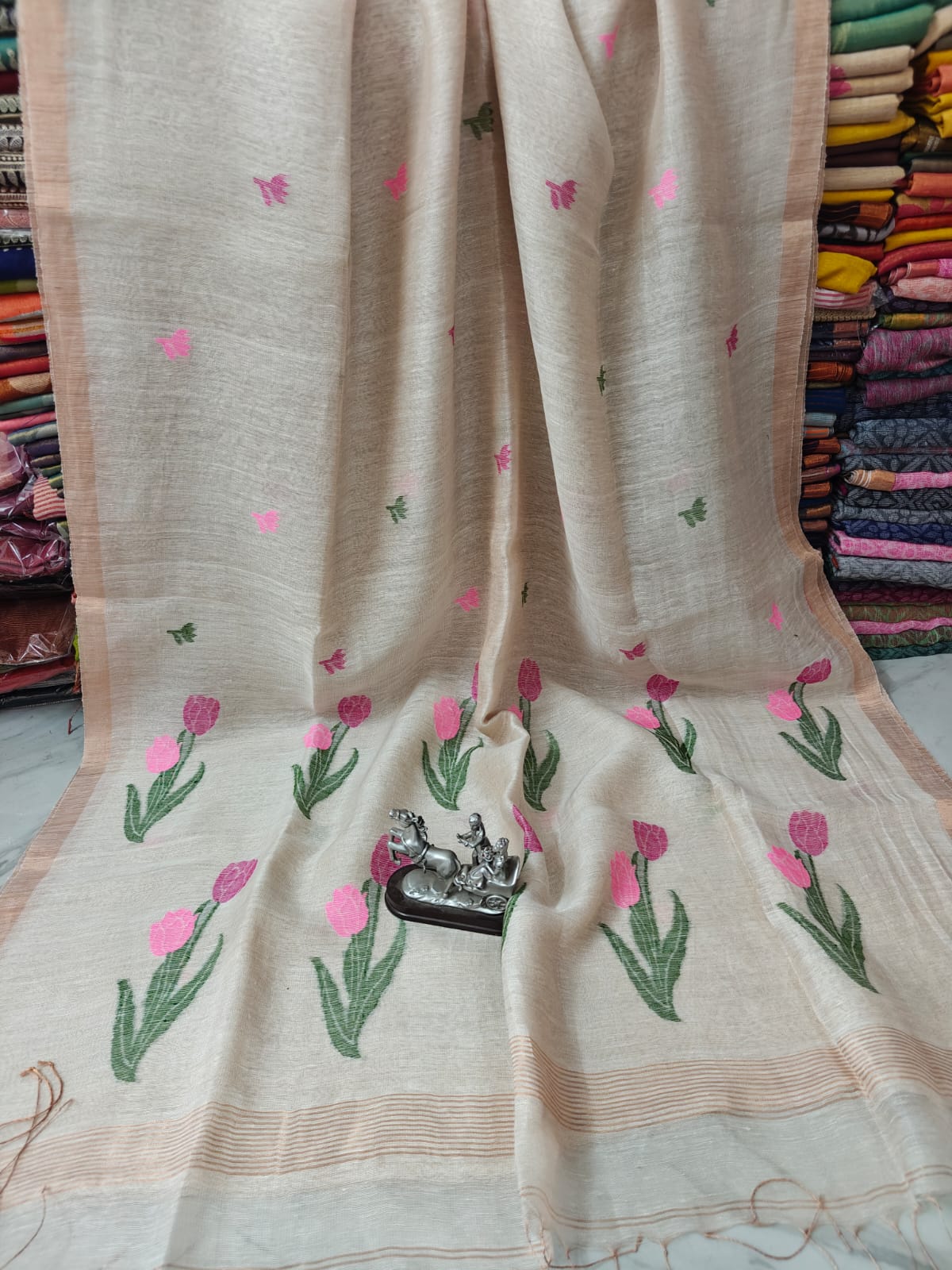 Lilac silk linen saree with intricate Jamdani weaved anchal by Rihyaaz, showcasing elegant traditional Indian handloom craftsmanship.