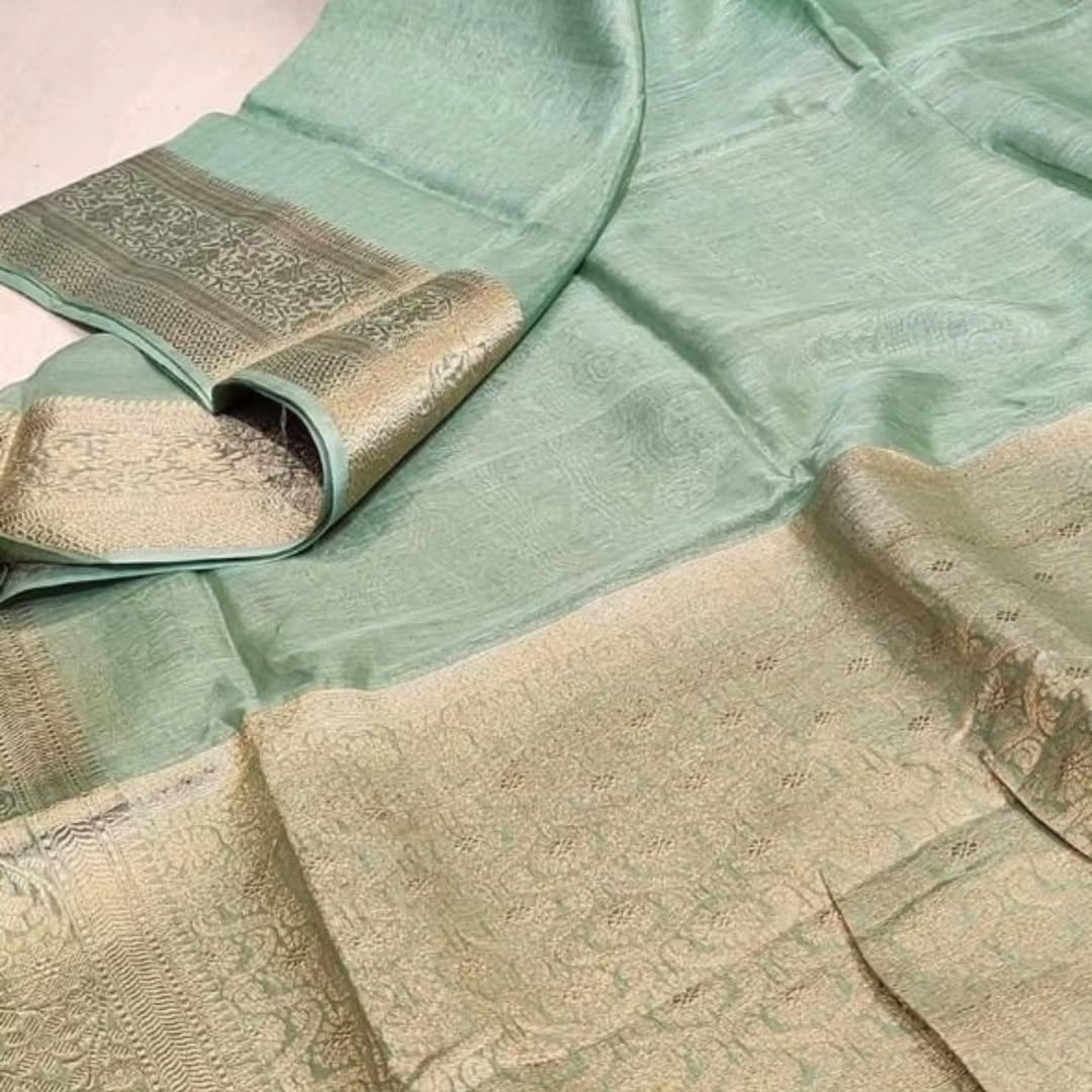 Ikangshi linen Benarasi saree with tested zari weaving and running blouse piece by Rihyaaz