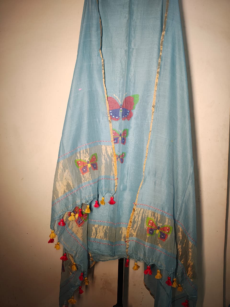 Titli trio zari handwoven Mul Cotton suit with delicate butterfly motifs and elegant zari detailing for a refined royal look by Rihyaaz 