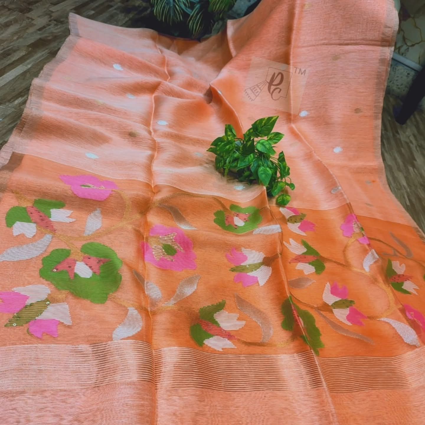 Handwoven Linen by Muslin Floral motifs saree with all-over needle weave work and golden zari border, blouse piece available | Rihyaaz