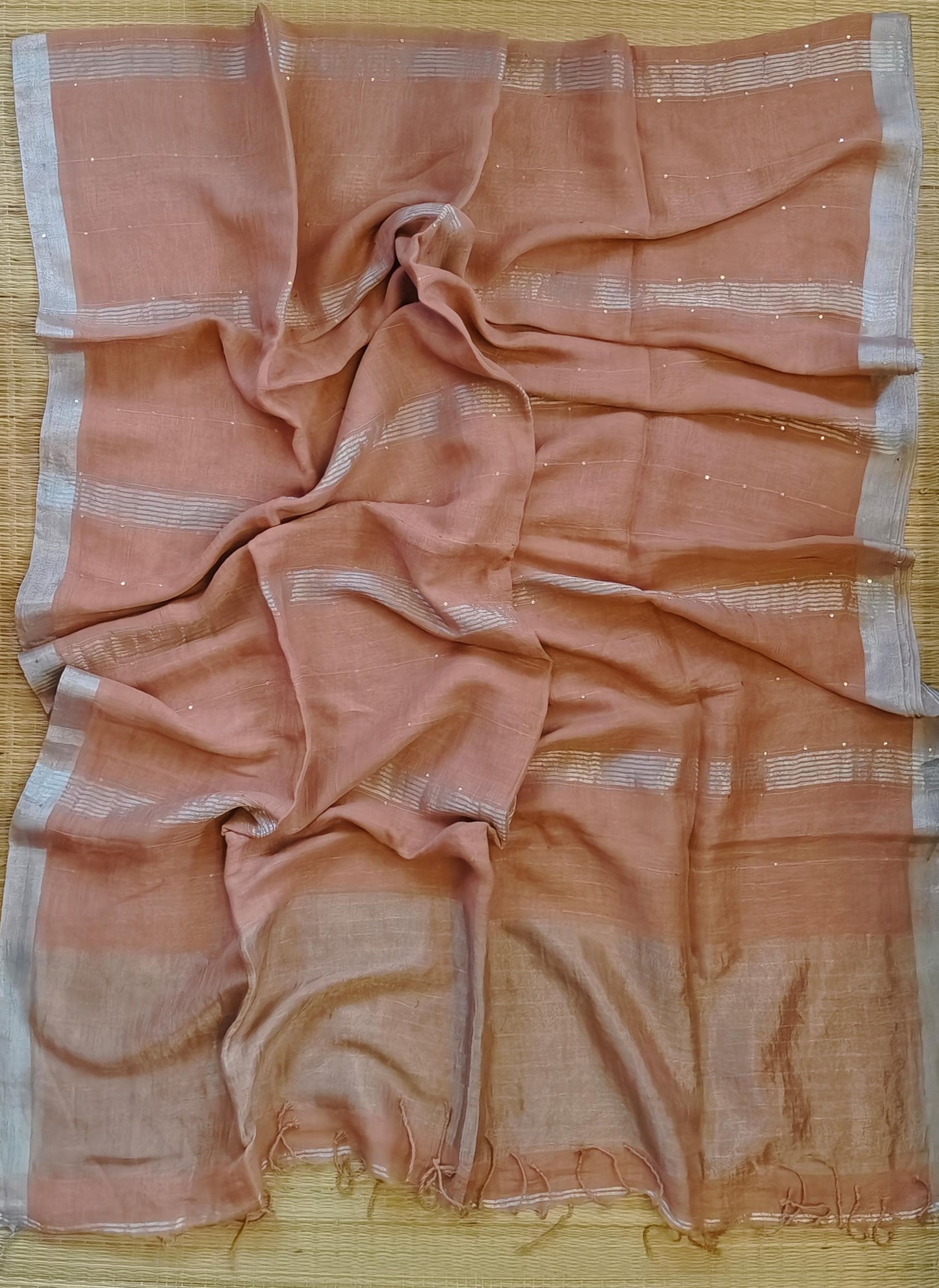 Pehal Premium Jayashree linen saree with tested zari pallu, sleek silver border, all-over sequin-line detailing and zari-striped blouse piece by Rihyaaz.