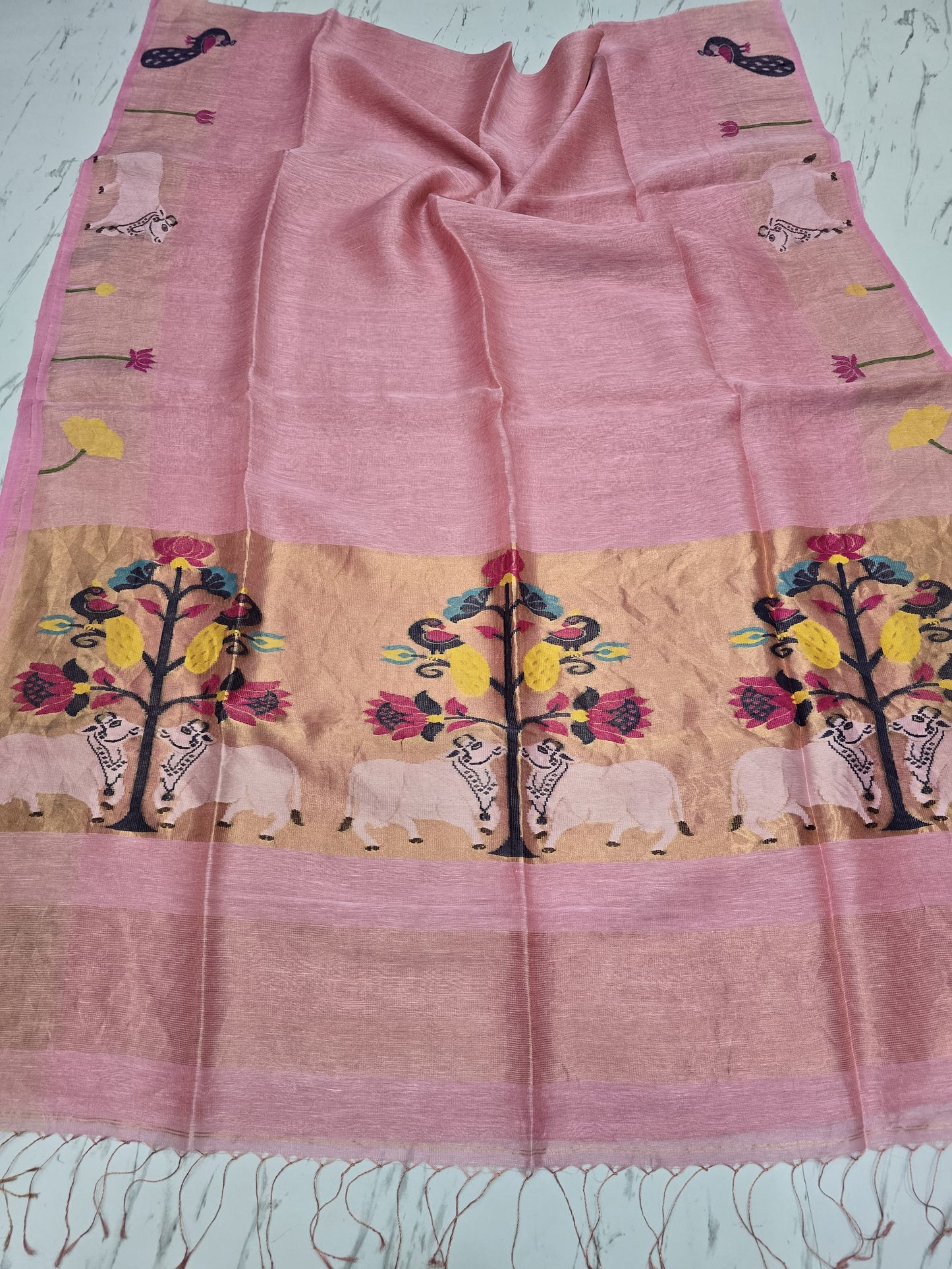Suravi Silk Linen Pichwai Inspired Jamdani Saree by Rihyaaz featuring intricate handwoven Pichwai-inspired motifs on premium silk linen fabric, ideal for festive, wedding, and ethnic wear.