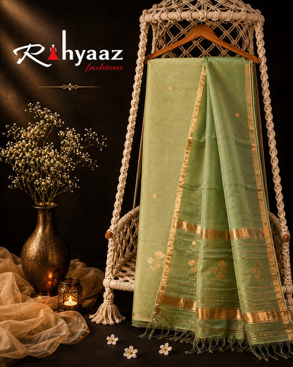 Lipi Light Sage Green Resham Linen Zari Jamdani suit with zari border and heavy palla Resham dupatta by Rihyaaz