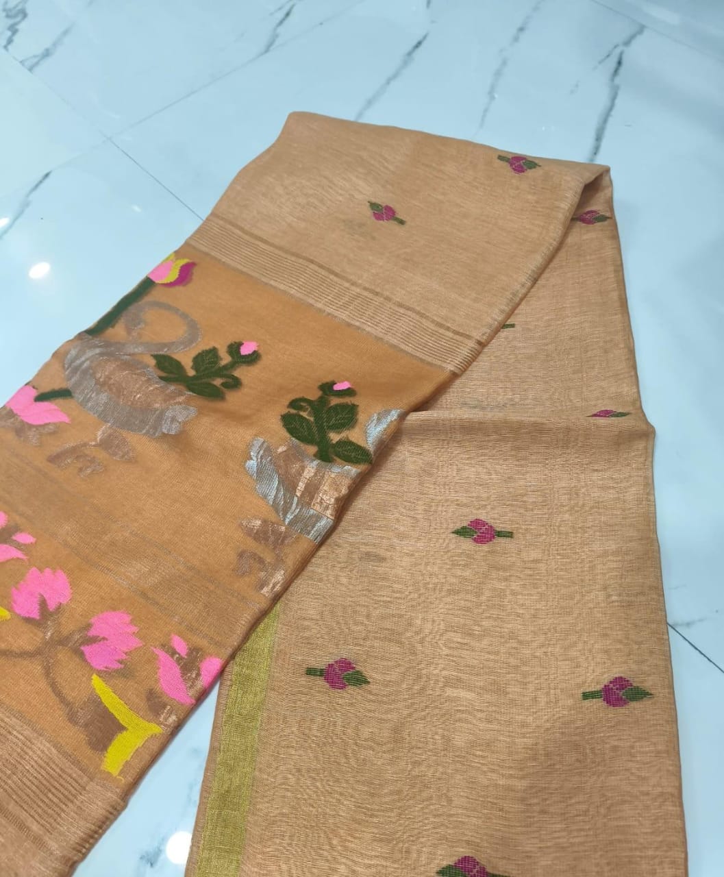 Batakh Silk Tissue Linen Saree by Rihyaaz – a luxurious handwoven saree blending silk tissue elegance with timeless Indian craftsmanship. Perfect for festive and occasion wear.