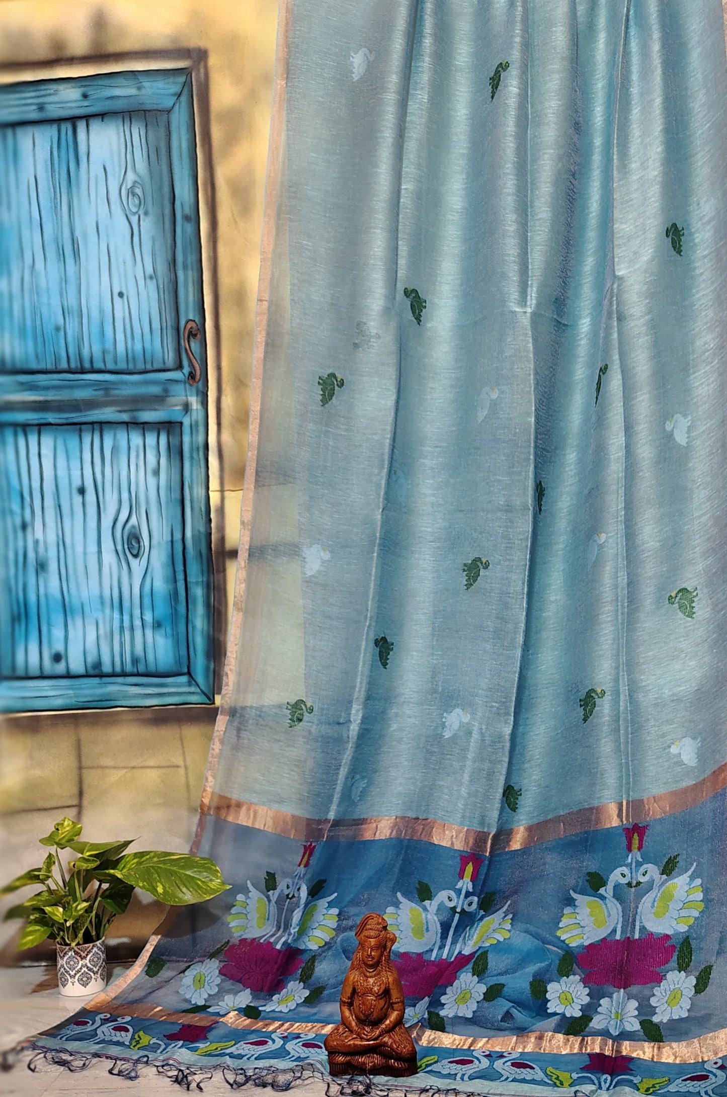 Shankh premium Silk Linen saree featuring an intricate Jamdani weave and elegant Resham Palla, crafted in traditional handloom style by Rihyaaz.