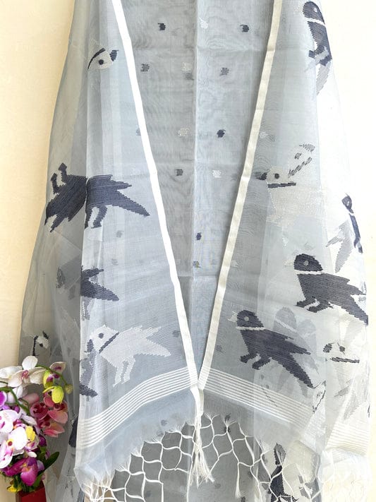 Chidiya muslin woven suit with zari and silk weaving, featuring polka dot motifs on the top by Rihyaaz Fashions.