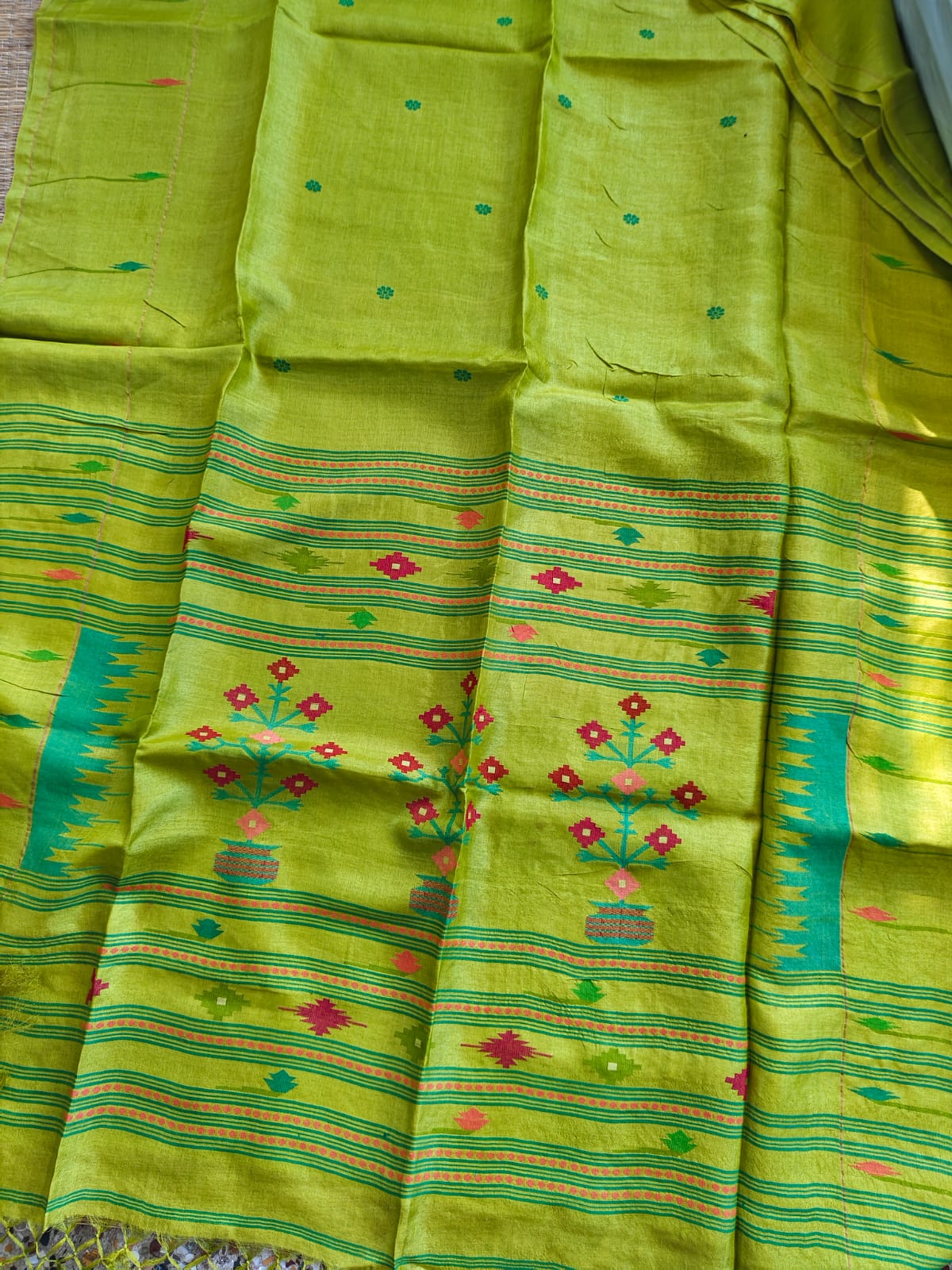Swarnim Light Green Paithani Bengal Tussar saree with intricate Jamdani weaving and running blouse piece by Rihyaaz Fashions.