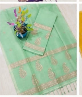 Kairi light green Pure Silk Linen Jamdani suit with handwoven detailing and net tassel dupatta by Rihyaaz