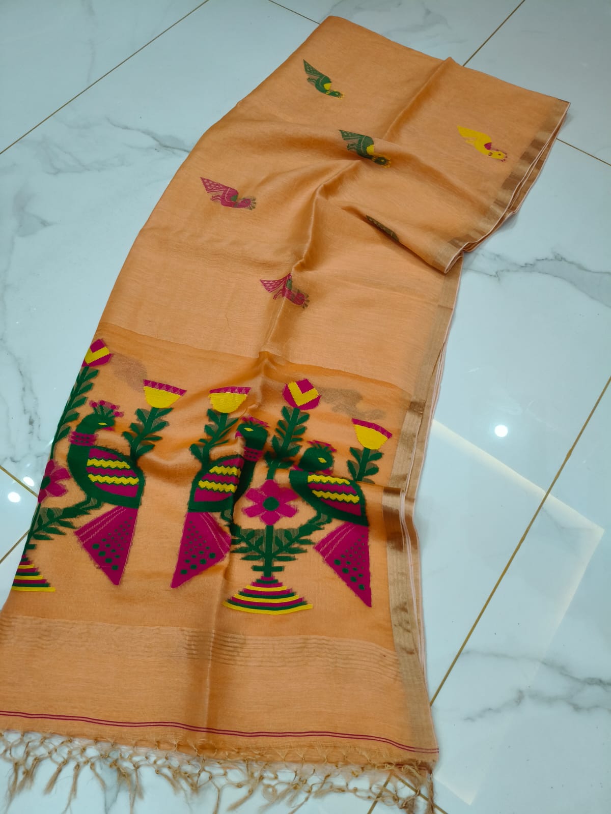 Mayur light peach pure Jayasree linen tissue saree with pure tested zari and Paithani Jamdani work, featuring a running blouse piece by Rihyaaz.