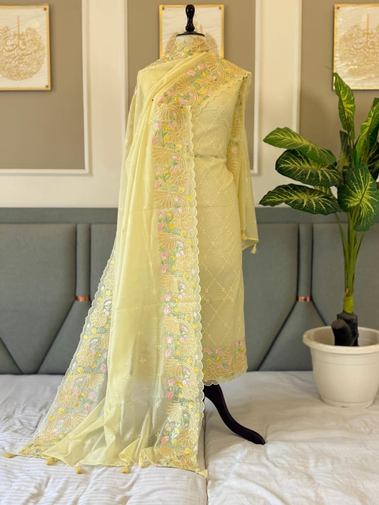 Exclusive light yellow Banarasi Mal Chanderi tissue suit set by Rihyaaz Fashions featuring an embroidered appliqué work top, matching tissue dupatta and plain cotton silk bottom, 2.5 metres each.