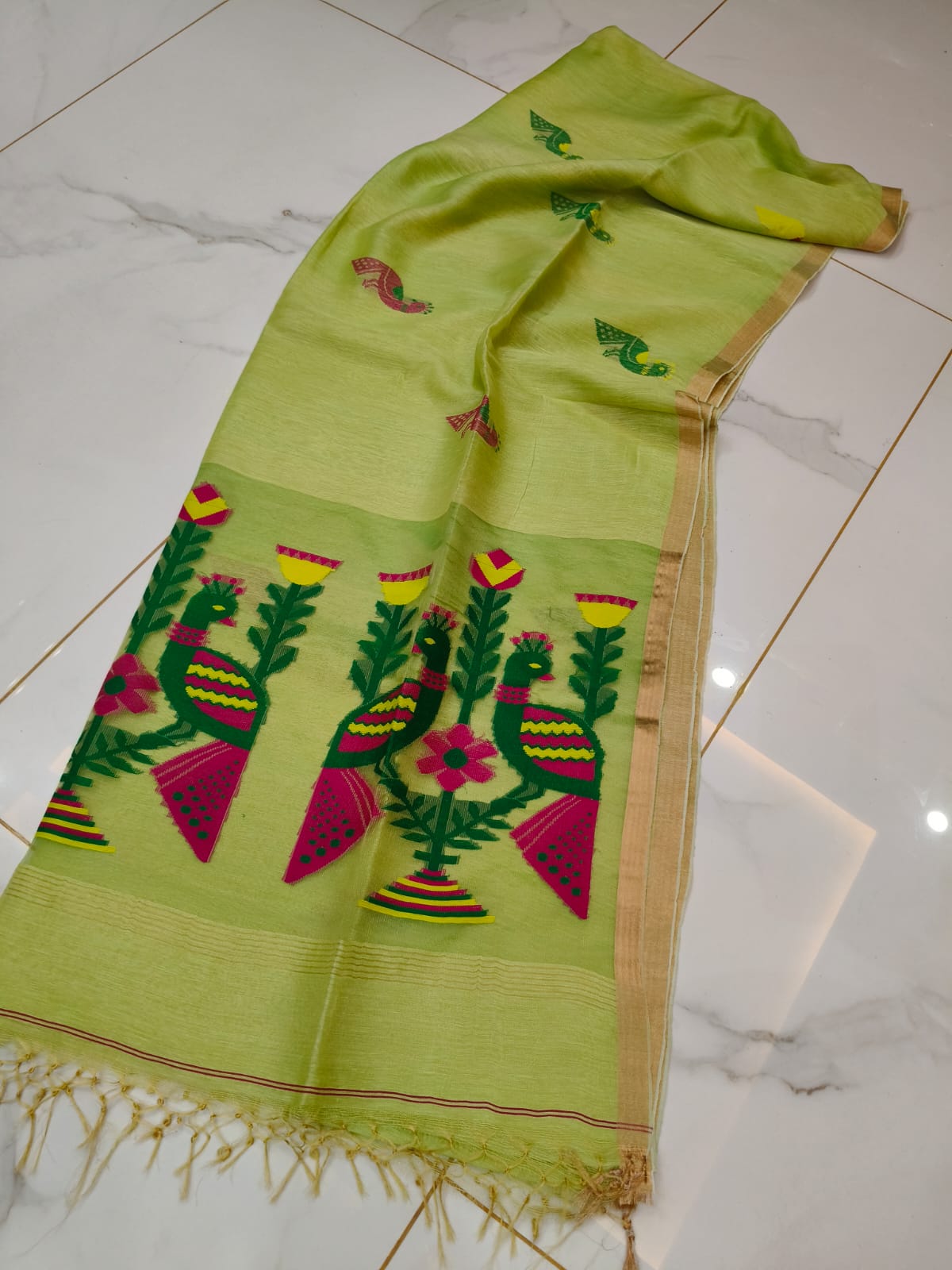 Mayur lime green pure Jayasree linen tissue saree with pure tested zari and Paithani Jamdani work, featuring a running blouse piece by Rihyaaz.