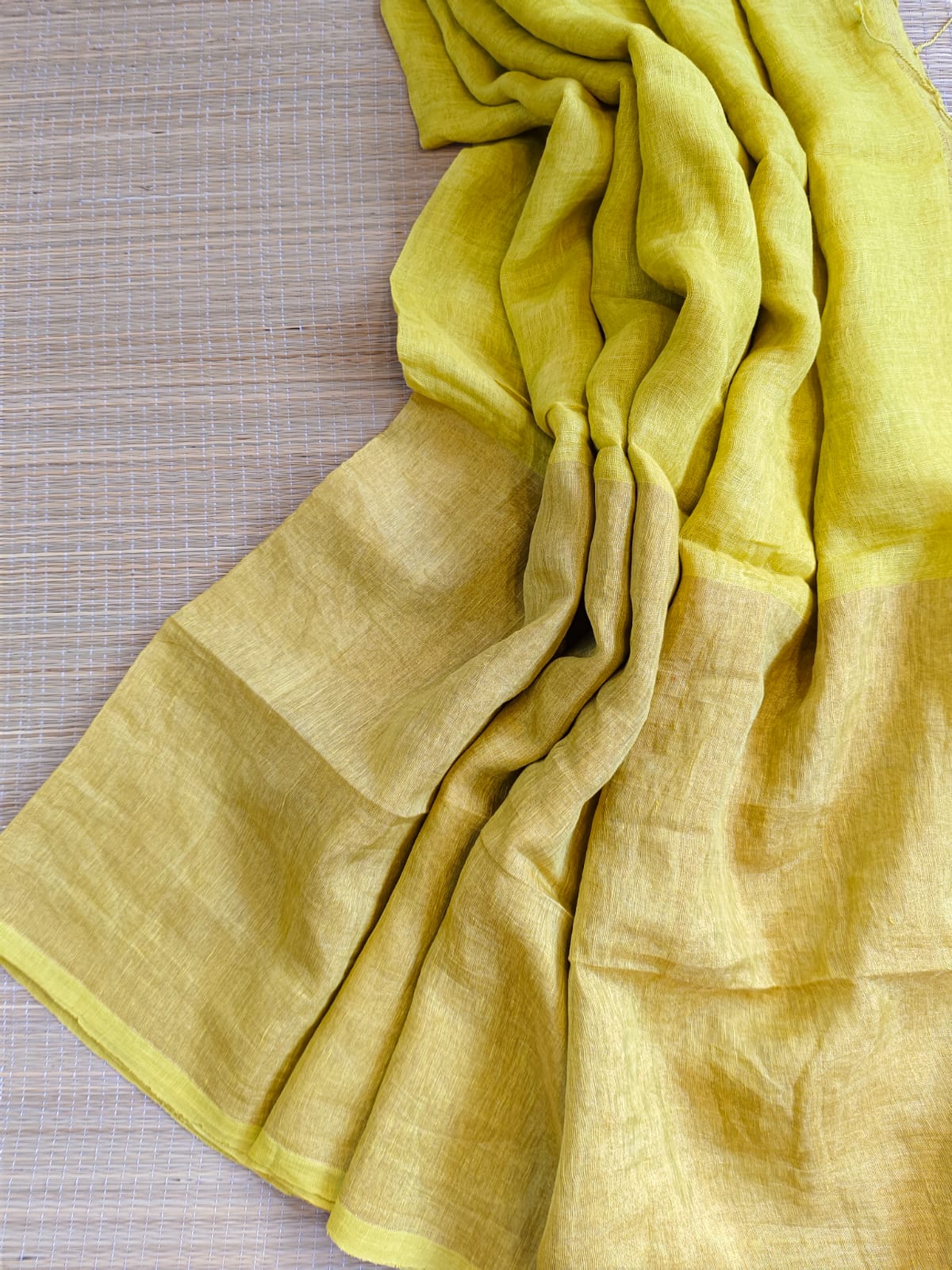 Yukti pure and premium Jayashree Linen half-and-half saree with elegant zari weaved lower portion and running blouse piece by Rihyaaz