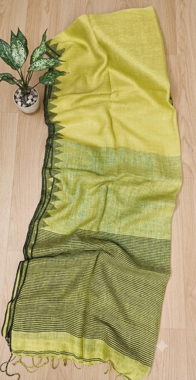 Lime green Pure silk Jayashree linen saree with traditional temple border, striped palla and running blouse piece by Rihyaaz Fashions.