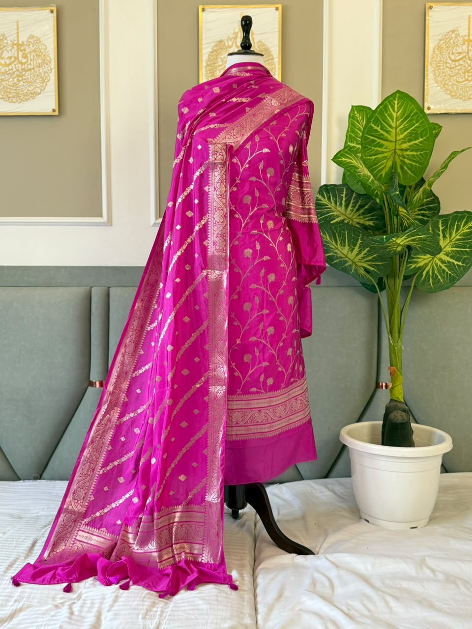 Exclusive Magenta Banarasi raw mango silk unstitched salwar kameez with zari-woven top, woven silk dupatta and Silk Katan bottom by Rihyaaz.
