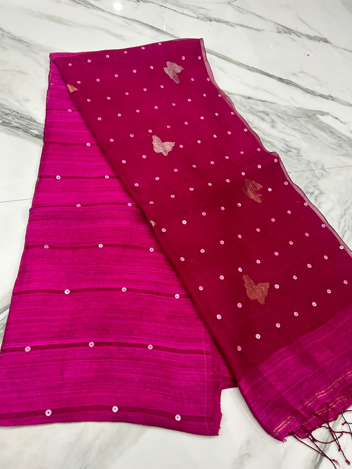 Titli Matka Resham saree with all-over weaved delicate shell sequin detailing and butterfly motifs by Rihyaaz.