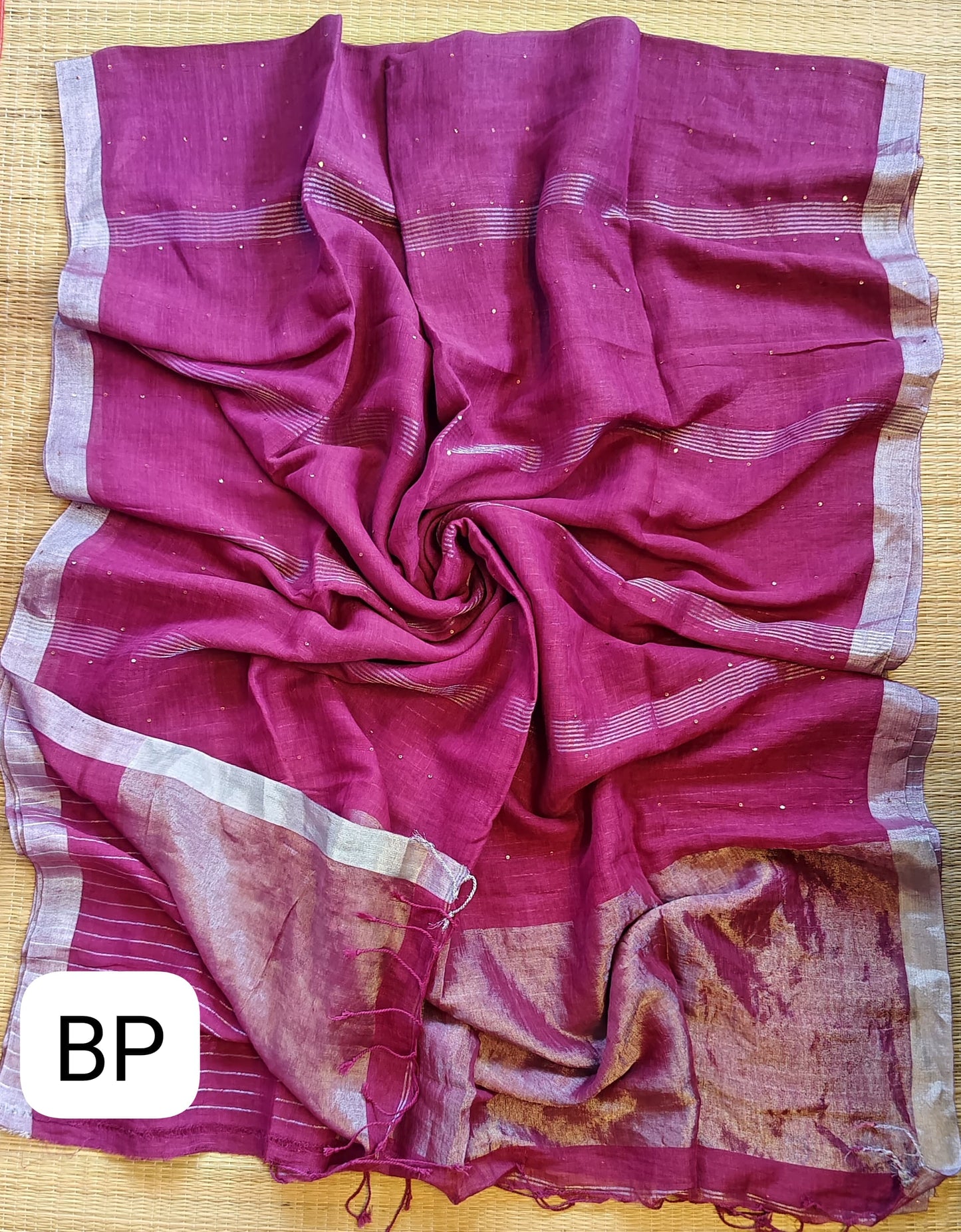 Pehal Premium Jayashree linen saree with tested zari pallu, sleek silver border, all-over sequin-line detailing and zari-striped blouse piece by Rihyaaz.
