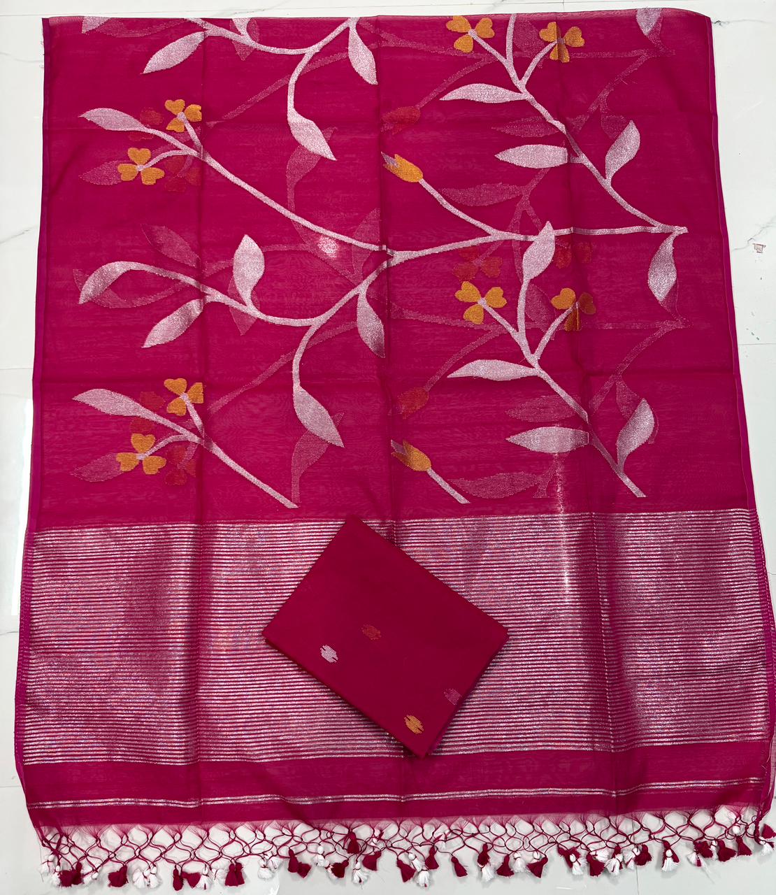 Rihyaaz Muslin Jamdani suit with handwoven detailing, 2.5 meter top and 2.5 meter tassel-finished jal work dupatta.