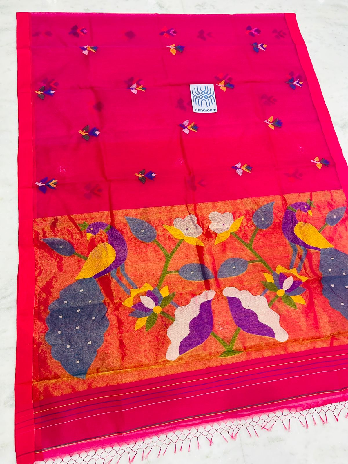 Shahi pure muslin handwoven saree with blouse piece by Rihyaaz, showcasing traditional Indian handloom craftsmanship and elegant woven texture.