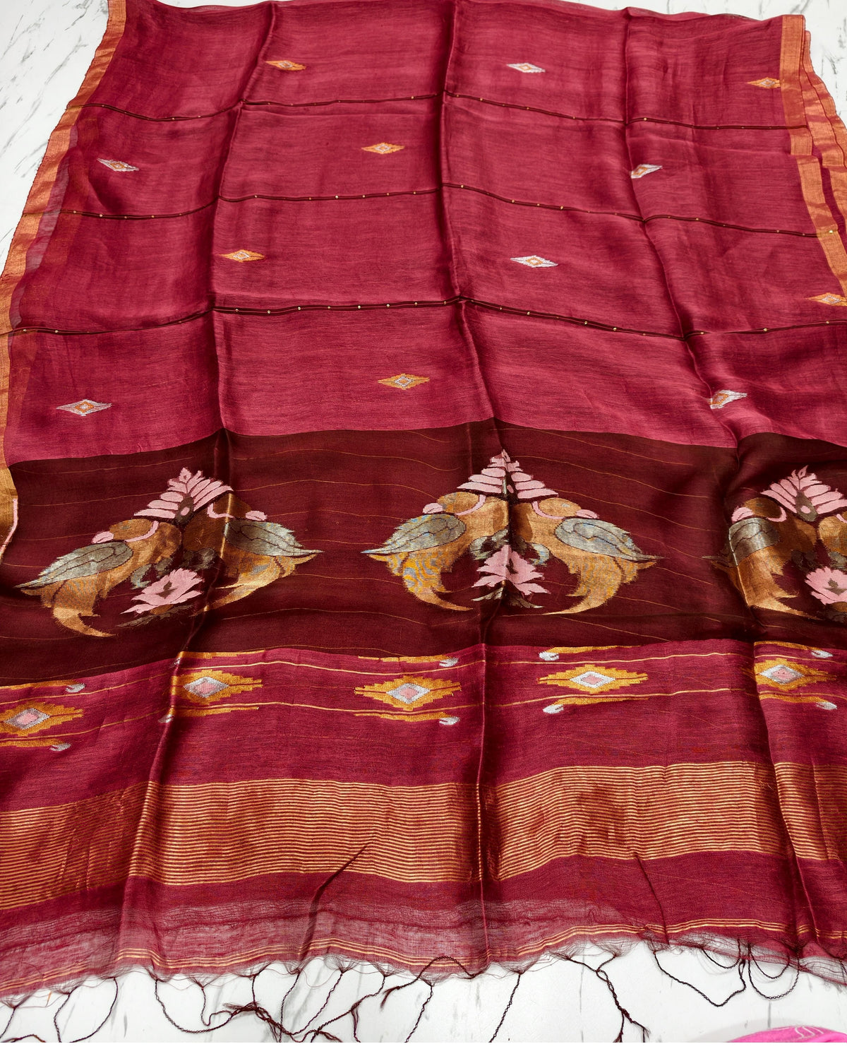 Moyna maroon silk linen saree with Resham palla and intricate Meenakari Jamdani handwoven detailing with bird motiffs by Rihyaaz