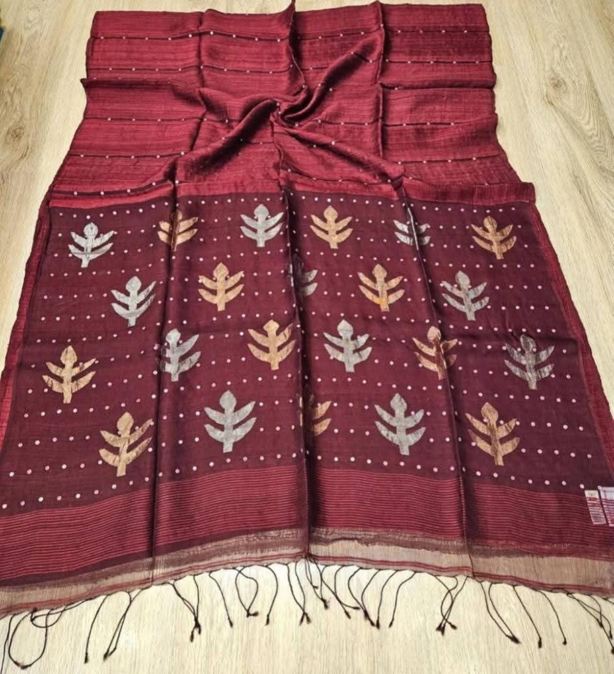 Taru Matka Muslin Silk saree with gold and silver zari motifs on pallu and white sequin sea-shell weave on body and palla by Rihyaaz