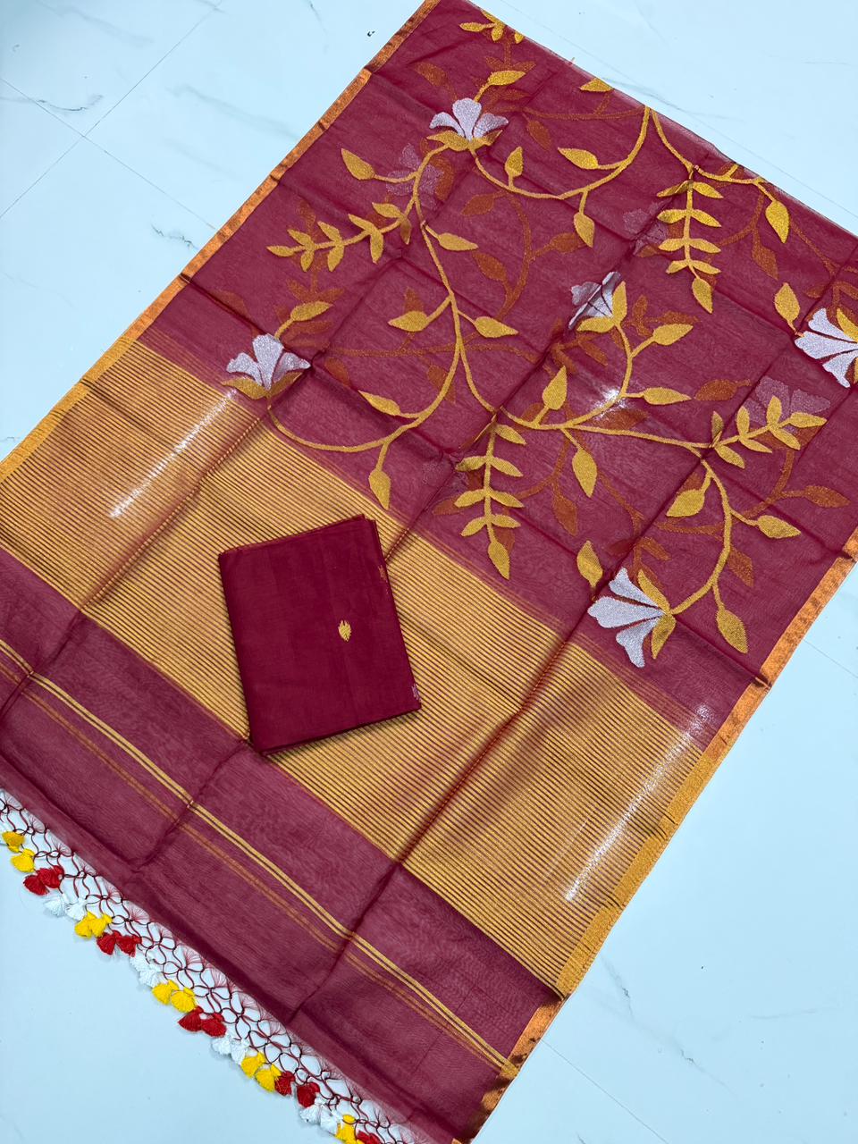 Rihyaaz Muslin Jamdani suit with handwoven detailing, 2.5 meter top and 2.5 meter tassel-finished jal work dupatta.
