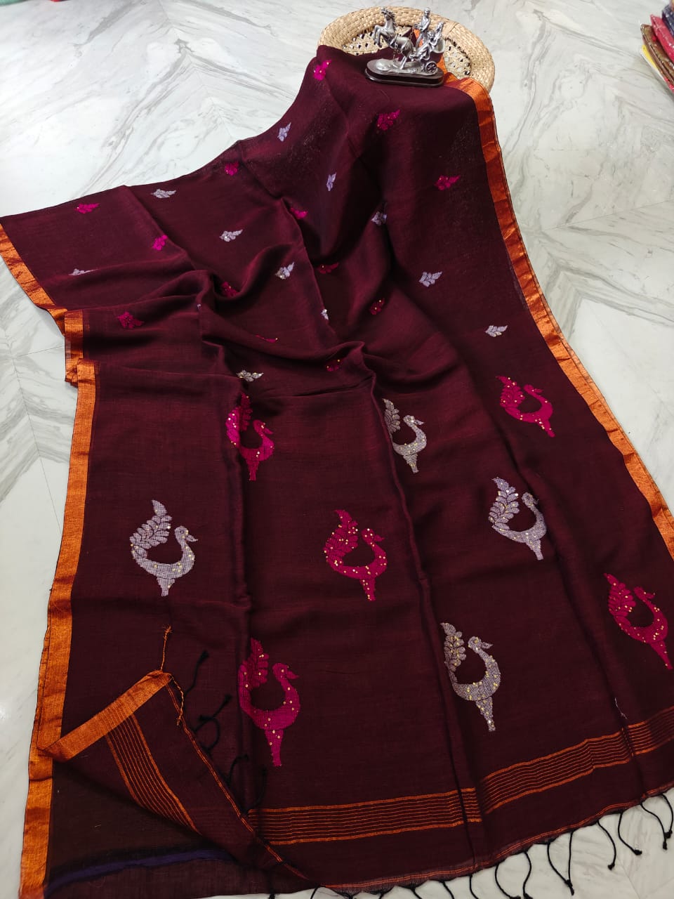 Exclusive Pure Linen by Linen Peacock Jamdani handwoven saree with all-over body Mina work and running blouse piece by Rihyaaz.