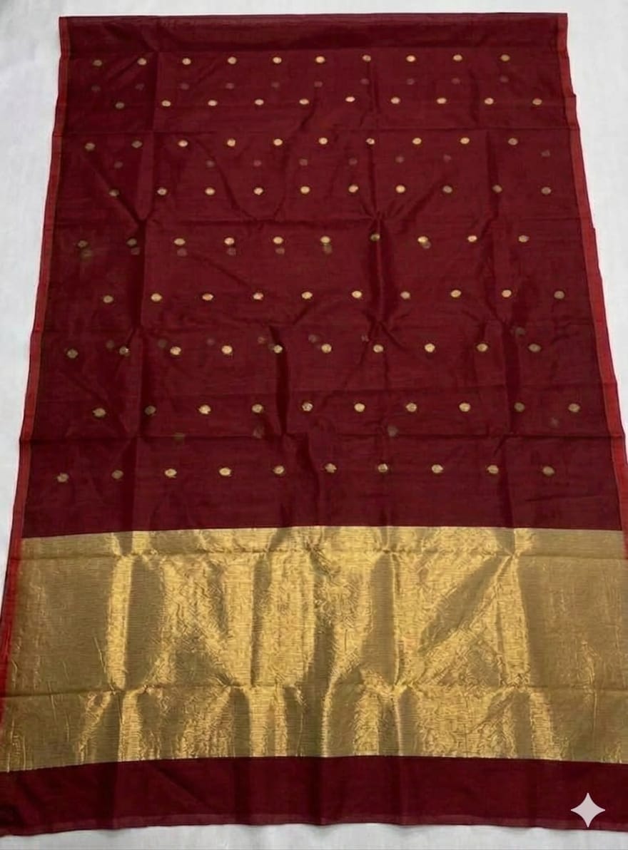 Pure muslin allover zari weaved butti works handwoven saree with zari pallu and a running blouse piece by Rihyaaz.