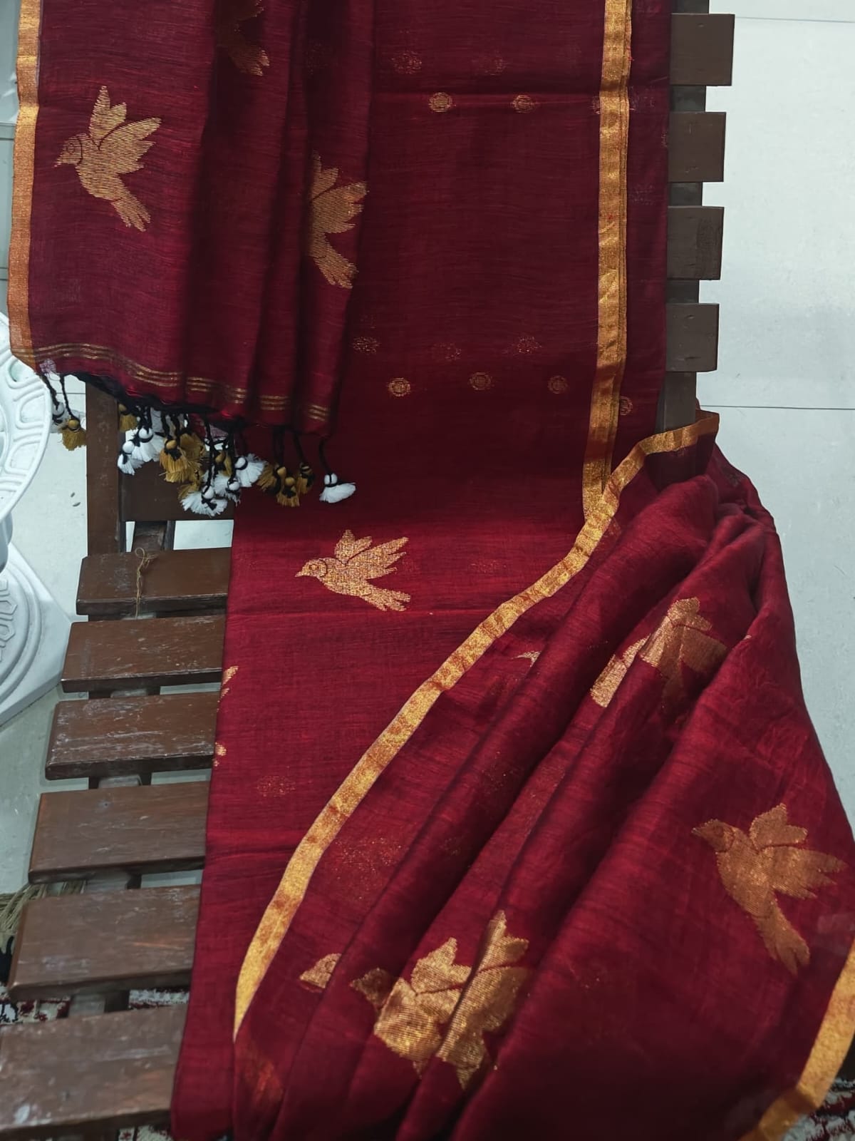 Chorui silk linen zari-weaved suit featuring intricate traditional bird motifs with a 2.5-meter top and 2.5-meter dupatta by Rihyaaz.