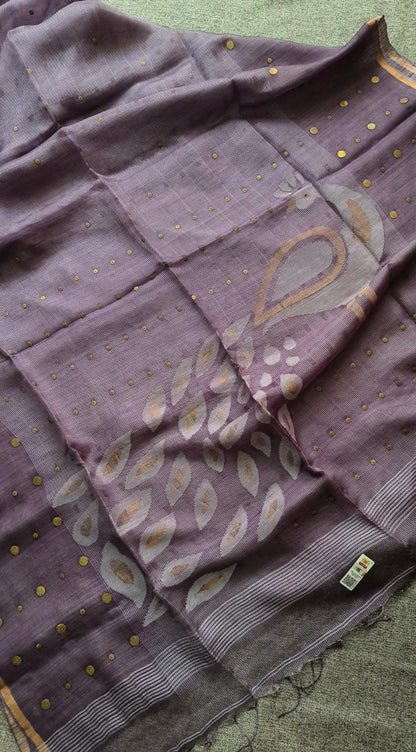 Keka premium Resham Silk Jamdani saree with handwoven needle Jamdani work, metal gini embellishments, peacock motif pallu, thin zari border, and running blouse piece.