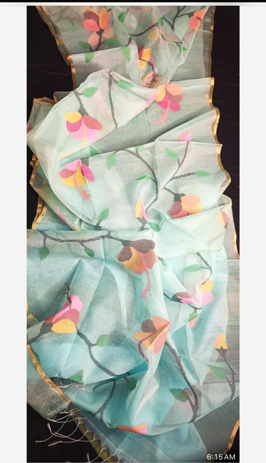 Blossom muslin Jamdani saree with allover floral handwoven motifs by Rihyaaz