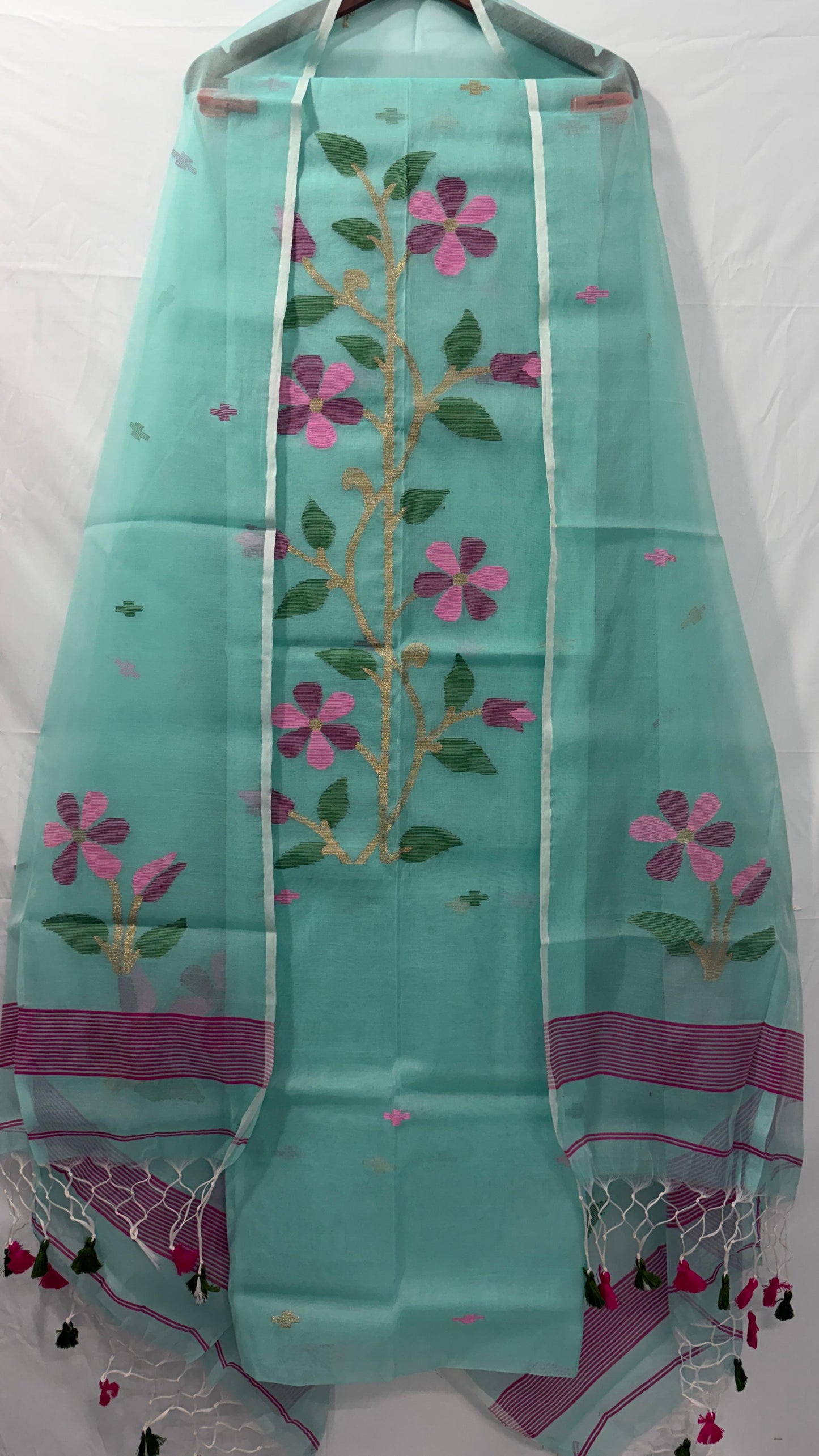 Rihyaaz Muslin Jamdani suit with handwoven detailing, 2.5 meter top and 2.5 meter tassel-finished dupatta.